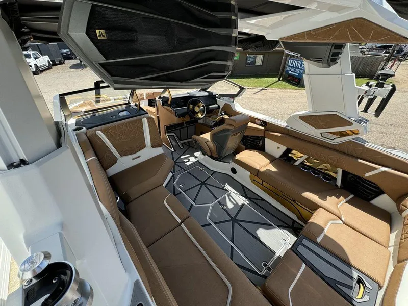 Slide: The Image of Luxurious interior of 2025 Nautique PARAGON 23 boat with modern seating and sleek design. - 7