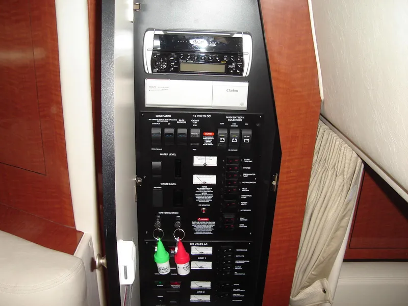 Slide: The Image of Electrical control panel on a 2005 Sea Ray 340 Sundancer boat. - 17