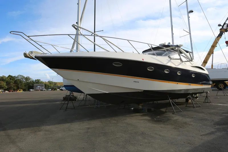 Slide: The Image of 1998 Sunseeker Camargue 44 yacht on dry dock, side view. - 1