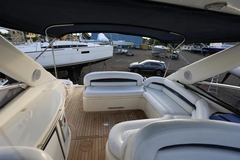 Slide: The Image of Sunseeker Camargue 44 yacht interior, 1998 model, featuring spacious seating and elegant design. - 15