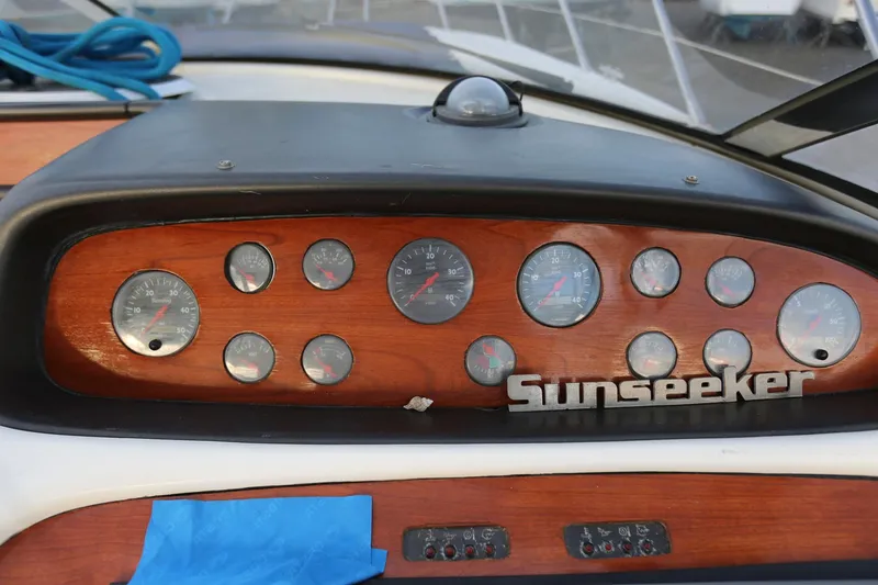 Slide: The Image of Dashboard of a 1998 Sunseeker Camargue 44 yacht with wooden panel and gauges. - 27