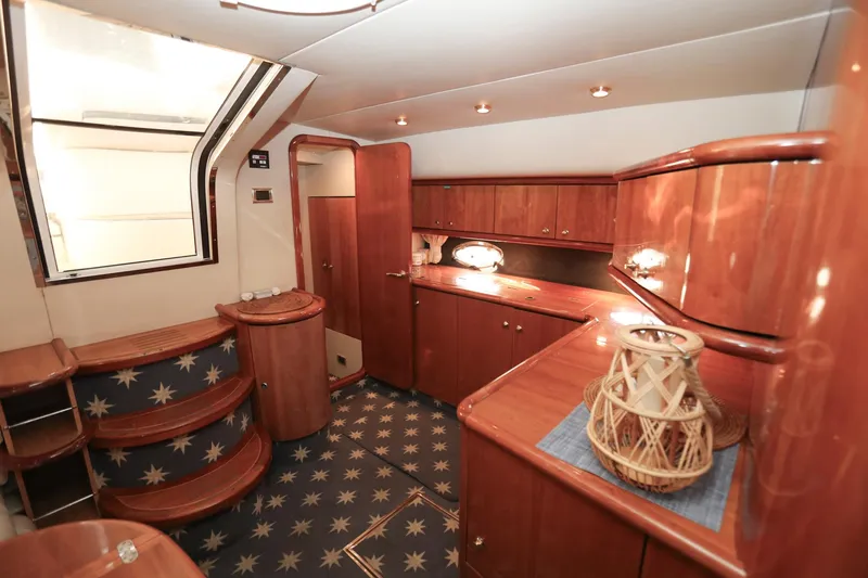 Slide: The Image of Luxurious interior of 1998 Sunseeker Camargue 44 yacht with elegant wood finishes. - 30