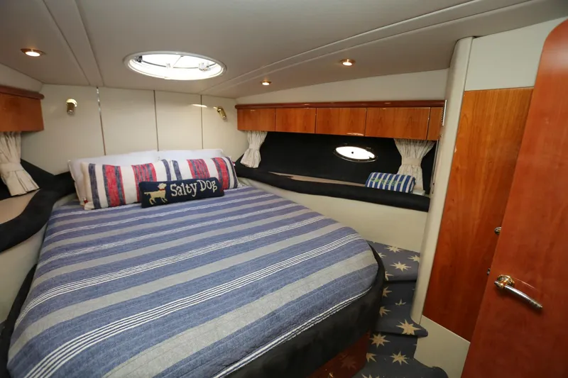 Slide: The Image of Luxurious bedroom interior of 1998 Sunseeker Camargue 44 yacht with striped bedding. - 39