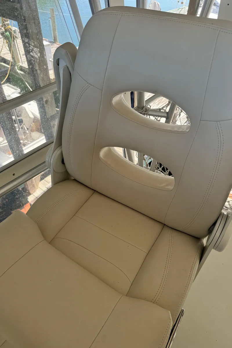 Slide: The Image of Luxurious beige seat on 1992 Post 46 Sportfish boat, featuring ergonomic design. - 28