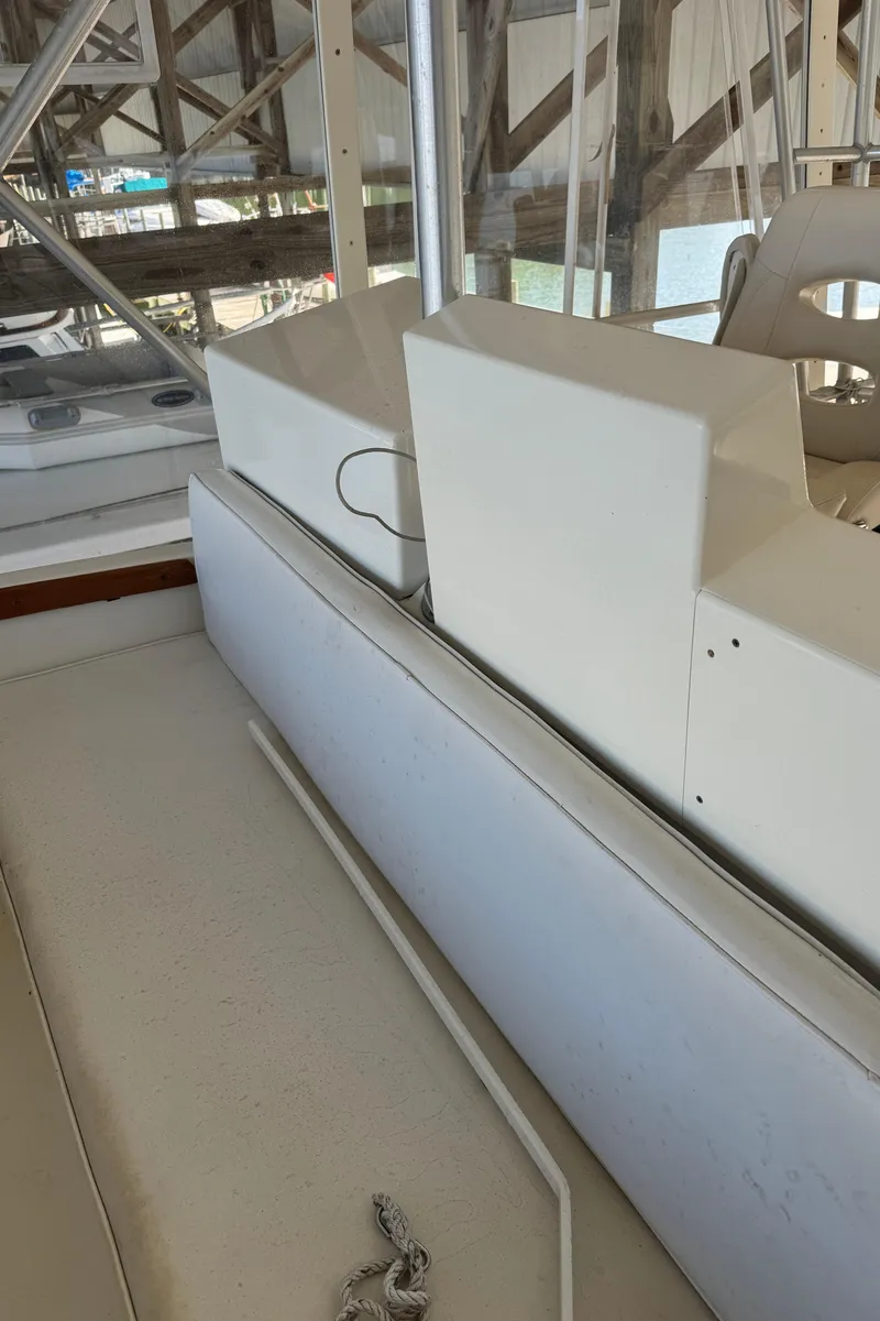 Slide: The Image of 1992 Post 46 Sportfish boat interior with seating and nautical equipment. - 30