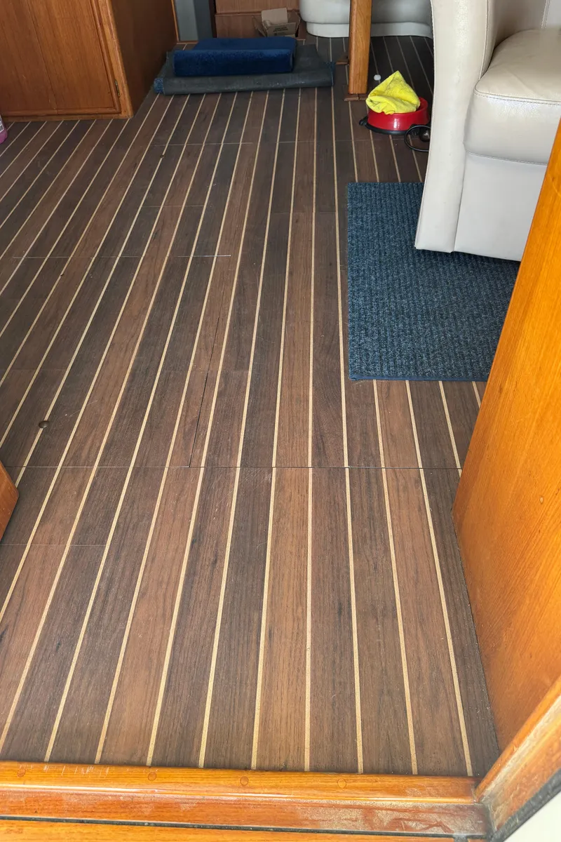 Slide: The Image of Interior view of 1992 Post 46 Sportfish boat with wooden flooring. - 35