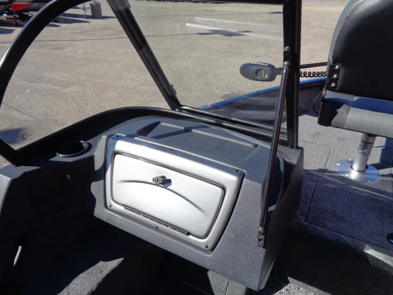 Slide: The Image of 2025 Tracker Pro Guide V-16 WT boat interior with dashboard and seating. - 8