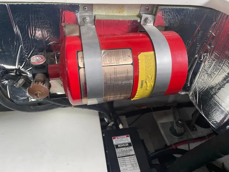 Slide: The Image of Fire extinguisher system in 2000 Carver 400 Express Yacht engine room. - 27