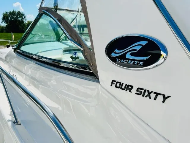 Slide: The Image of Sea Ray 460 Sundancer yacht, 1999 model, featuring sleek design and branding details. - 3