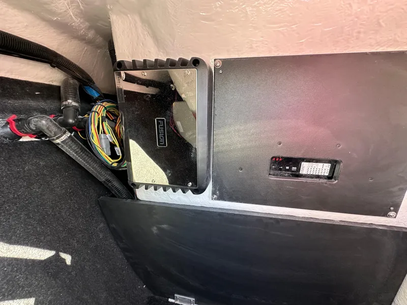 Slide: The Image of 2025 Regal LS4 Surf boat interior wiring and control panel. - 30