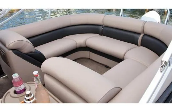 Slide: The Image of Luxurious seating on a 2012 Premier Solaris boat with drinks holder, near water. - 3