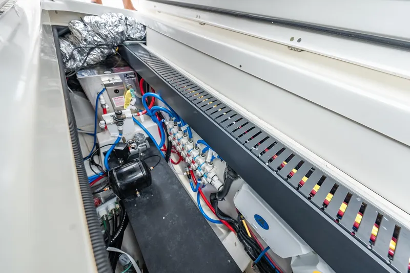 Slide: The Image of 2023 Pursuit S 428 Sport boat electrical system with wiring and components. - 46