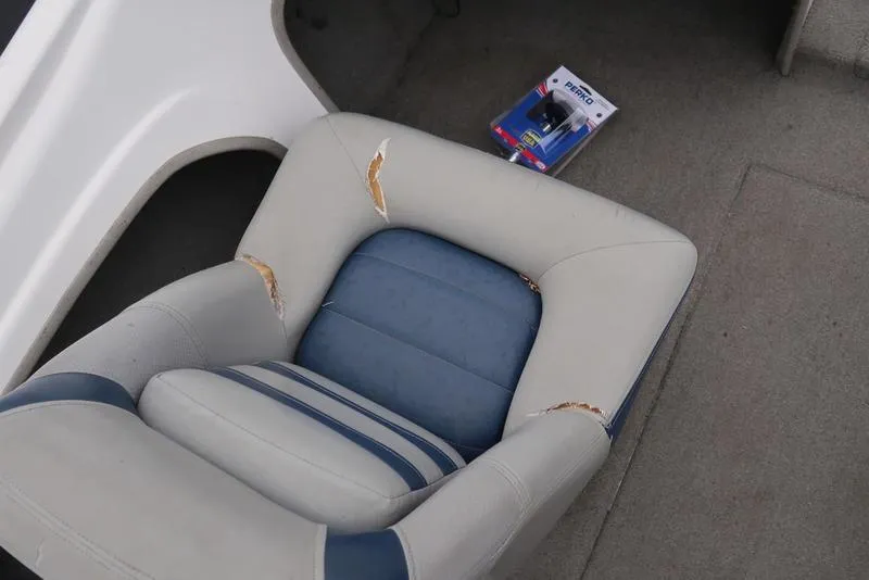 Slide: The Image of Worn seat in 2005 ProCraft 181 Combo boat interior. - 10