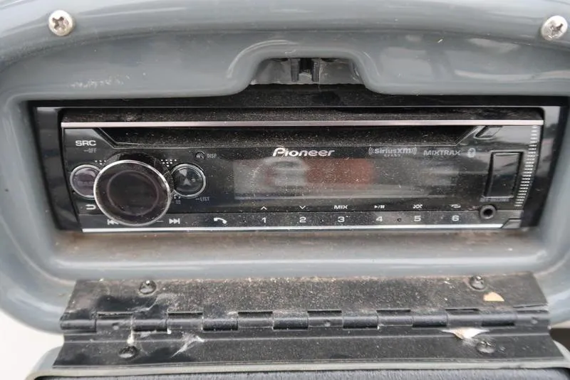 Slide: The Image of Pioneer stereo system in a 2005 ProCraft 181 Combo boat dashboard. - 12