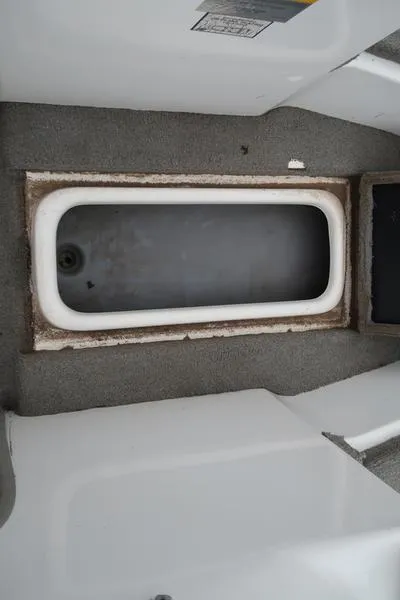 Slide: The Image of 2005 ProCraft 181 Combo boat storage compartment interior. - 15