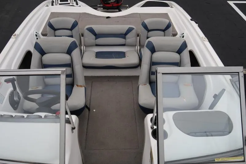 Slide: The Image of 2005 ProCraft 181 Combo boat interior with gray and blue seating arrangement. - 17