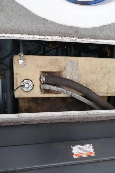 Slide: The Image of 2005 ProCraft 181 Combo boat fuel tank and hoses. - 18