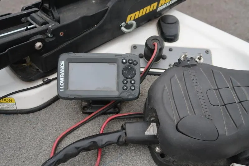 Slide: The Image of 2005 ProCraft 181 Combo boat dashboard with Lowrance fish finder and Minn Kota trolling motor. - 3