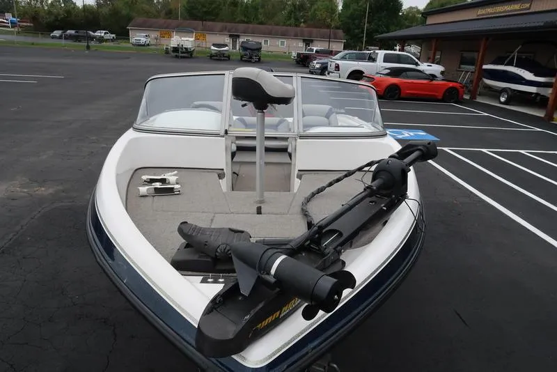 Slide: The Image of 2005 ProCraft 181 Combo boat with trolling motor in parking lot. - 4