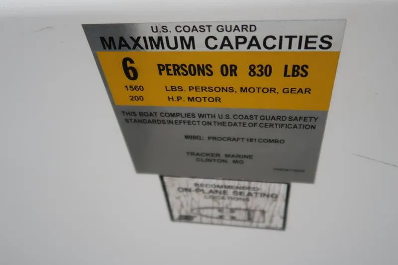 Slide: The Image of U.S. Coast Guard capacity label for 2005 ProCraft 181 Combo boat, 6 persons or 830 lbs. - 7