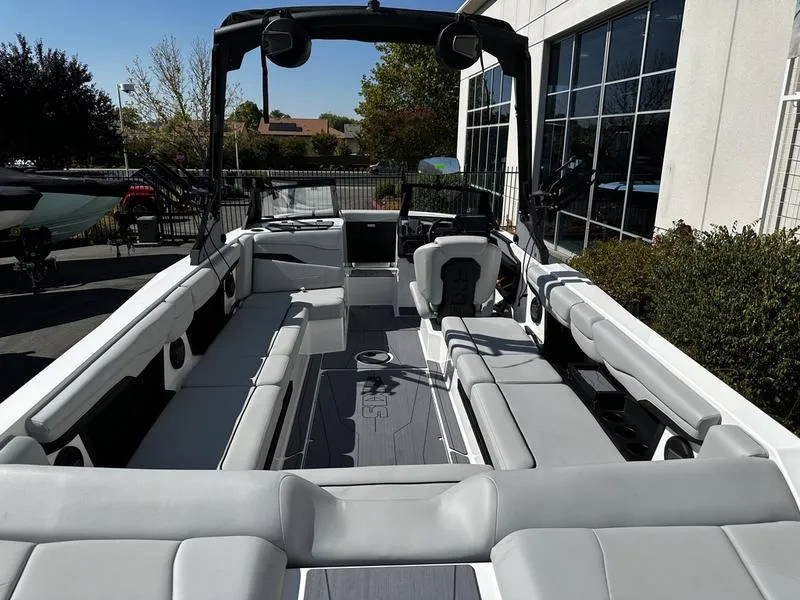 Slide: The Image of 2025 Axis T250 boat interior with spacious seating and modern design. - 4