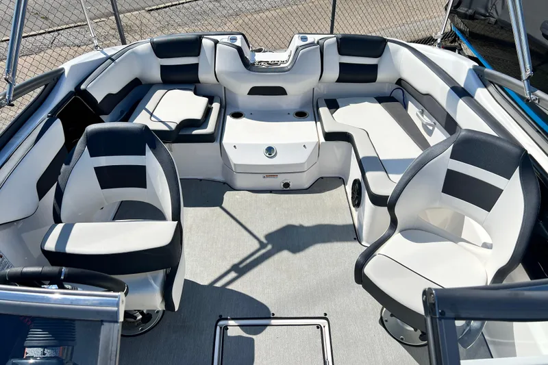 Slide: The Image of 2021 Yamaha Boats SX195 interior with stylish seating and modern design. - 13