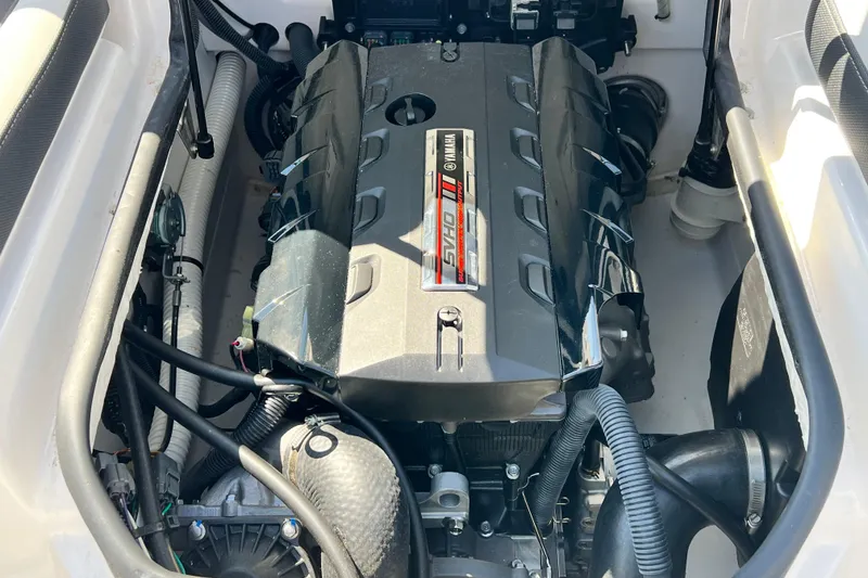 Slide: The Image of Engine compartment of 2021 Yamaha Boats SX195, showcasing powerful SHO engine design. - 19