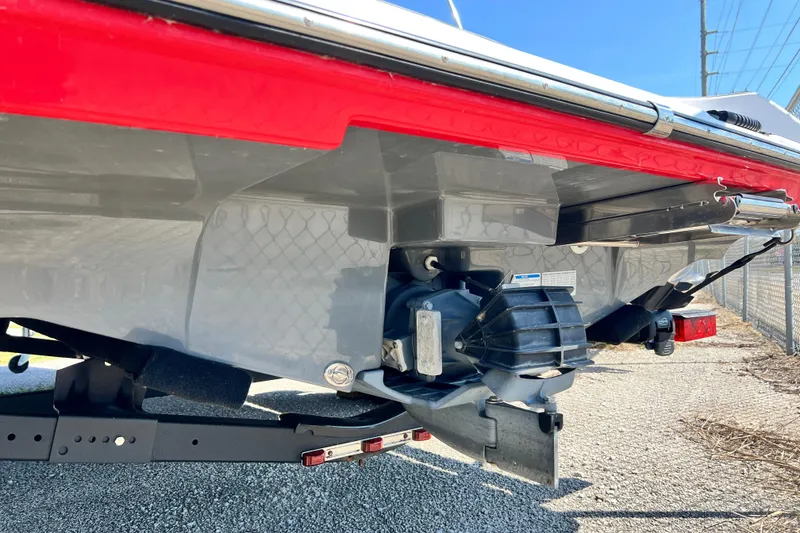 Slide: The Image of 2021 Yamaha Boats SX195 rear view showing hull and jet drive system. - 22