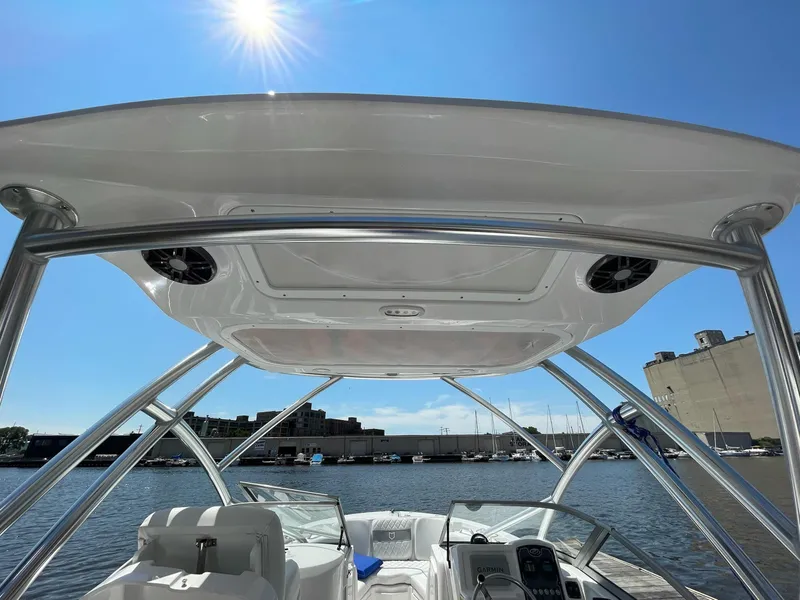 Slide: The Image of 2024 Sea Fox 228 Traveler boat interior with sunroof and waterfront view. - 5
