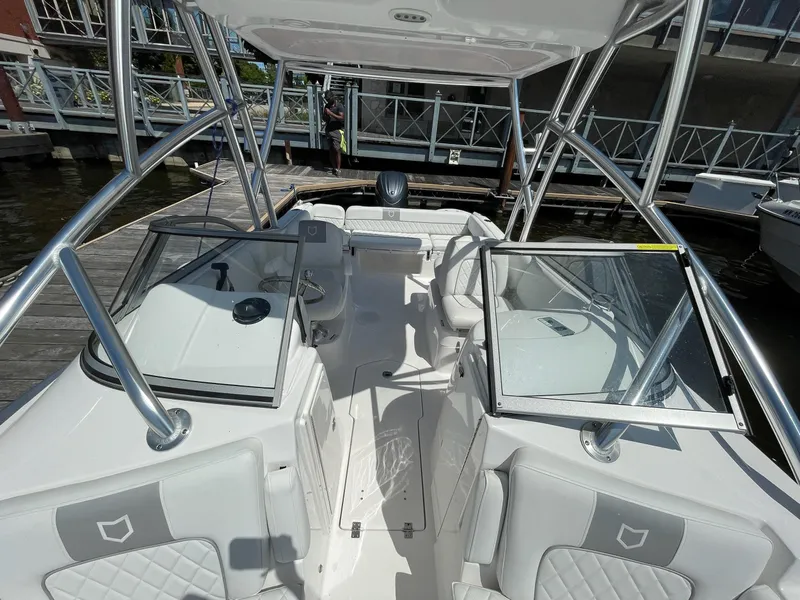 Slide: The Image of 2024 Sea Fox 228 Traveler boat interior with open windshield and seating. - 6