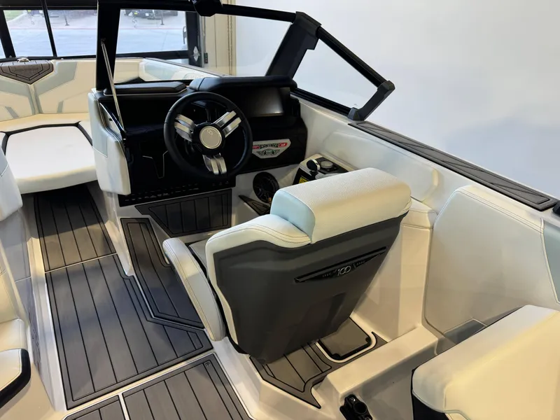 Slide: The Image of 2025 Nautique Super Air Nautique GS22 interior with sleek design and modern controls. - 24