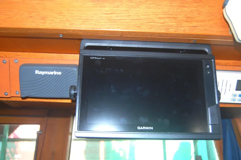 Slide: The Image of Garmin and Raymarine navigation equipment on 1985 Sundowner Tug Princess Louisa. - 26