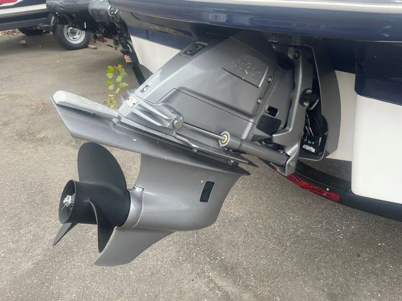 Slide: The Image of 2023 Chaparral 21 SSi boat outboard motor and propeller on display. - 18