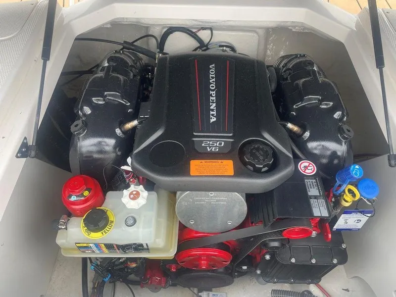 Slide: The Image of 2023 Chaparral 21 SSi boat engine, featuring a Volvo Penta 250 V8 motor. - 9