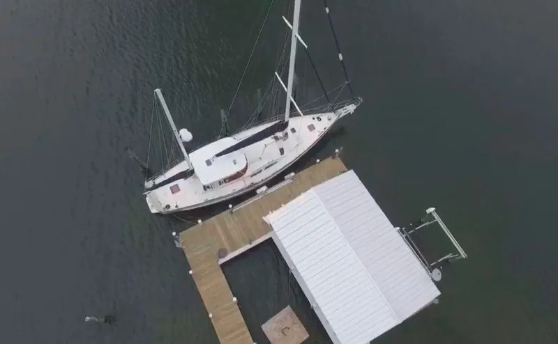 Slide: The Image of Aerial view of 1990 Irwin 54 sailboat docked at a marina. - 19