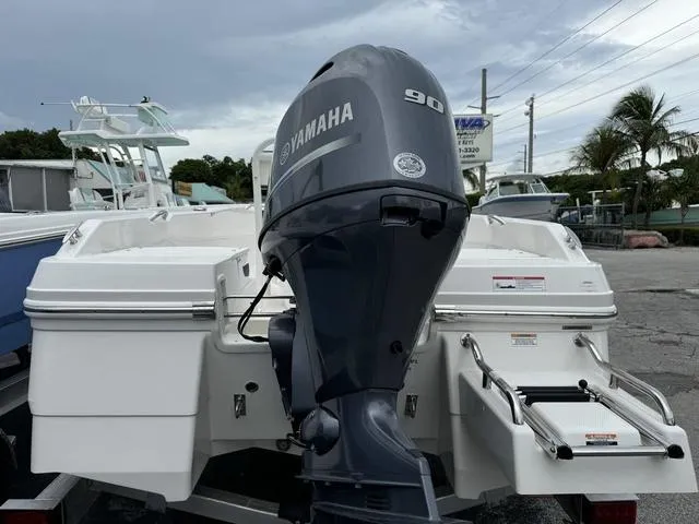 Slide: The Image of 2025 Robalo R160CC boat with Yamaha 90 outboard motor, rear view. - 3