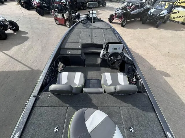 Slide: The Image of 2018 Skeeter ZX250 boat interior with dual seats and steering console. - 21