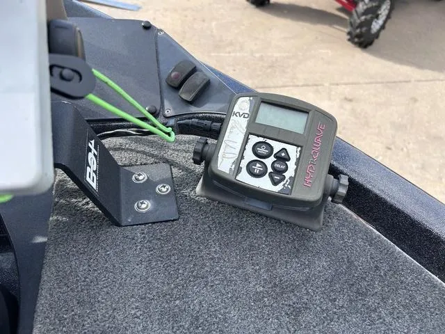 Slide: The Image of 2018 Skeeter ZX250 boat dashboard with electronic control panel. - 30