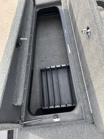 Slide: The Image of Open storage compartment in 2018 Skeeter ZX250 boat. - 36