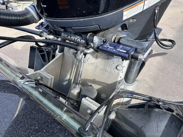 Slide: The Image of Close-up of 2018 Skeeter ZX250 boat engine components and wiring. - 41