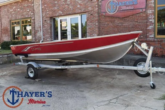 Slide: The Image of 2025 Lund SSV-16 Tiller boat on trailer at Thayer's Marine. - 1