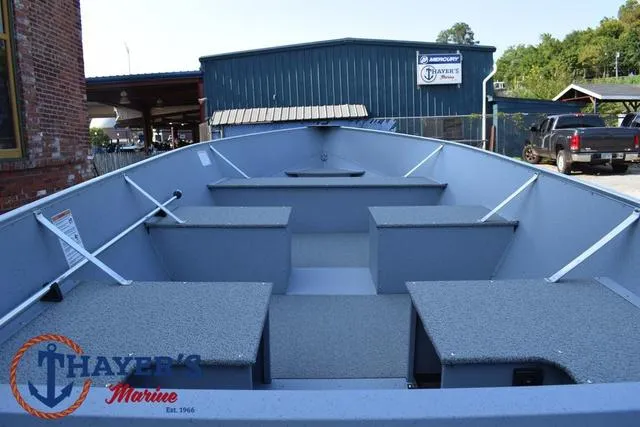 Slide: The Image of 2025 Lund SSV-16 Tiller boat interior at Thayer's Marine dealership. - 12