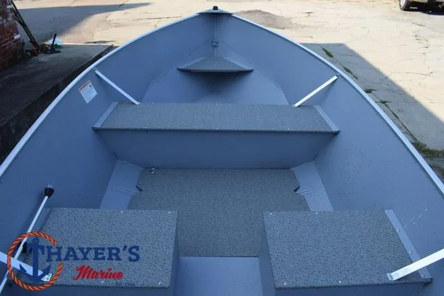 Slide: The Image of 2025 Lund SSV-16 Tiller boat interior with seating, showcased by Thayer's Marine. - 16