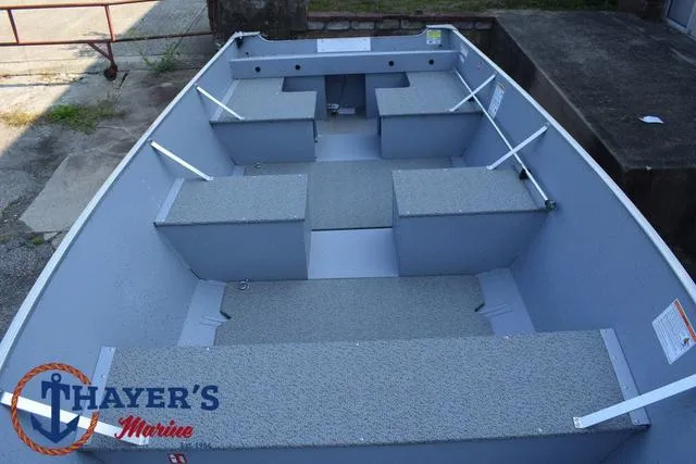 Slide: The Image of 2025 Lund SSV-16 Tiller boat interior with seating and storage compartments. - 17