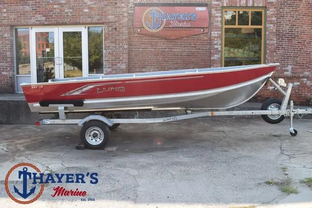 Slide: The Image of 2025 Lund SSV-16 Tiller boat on trailer at Thayer's Marine. - 2