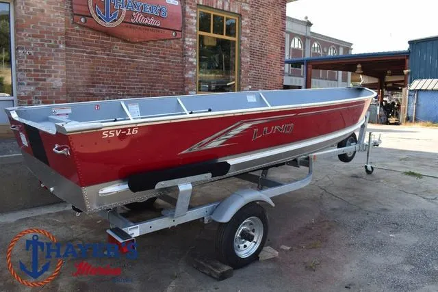 Slide: The Image of 2025 Lund SSV-16 Tiller boat on trailer outside Thayer's Marine. - 20