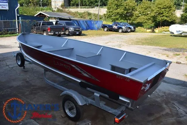 Slide: The Image of 2025 Lund SSV-16 Tiller boat on trailer in outdoor setting. - 9