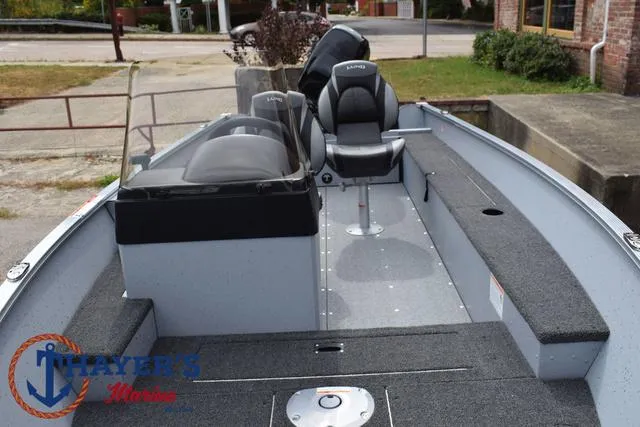Slide: The Image of 2025 Lund 1600 Fury SS boat interior with seating and console. - 13