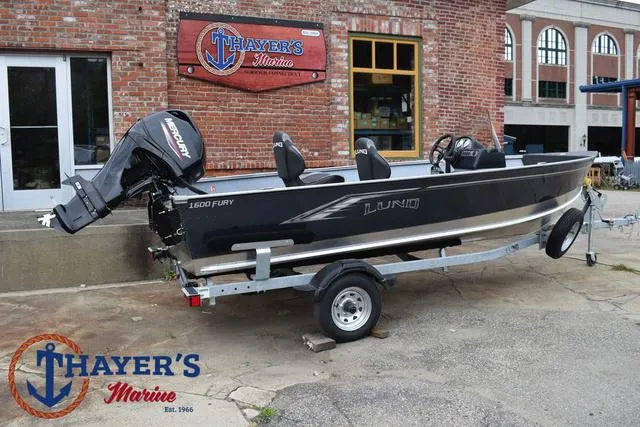 Slide: The Image of 2025 Lund 1600 Fury SS boat on trailer at Thayer's Marine. - 3