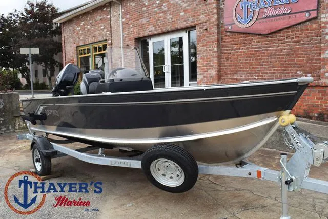 Slide: The Image of 2025 Lund 1600 Fury SS boat on trailer at Thayer's Marine. - 31